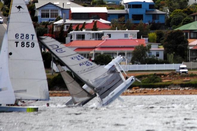 The F18 catamaran Wicked takes a nose-dive at the windward mark in the Crown Series Bellerive regatta. - 2015 Crown Series Bellerive Regatta © Peter Campbell